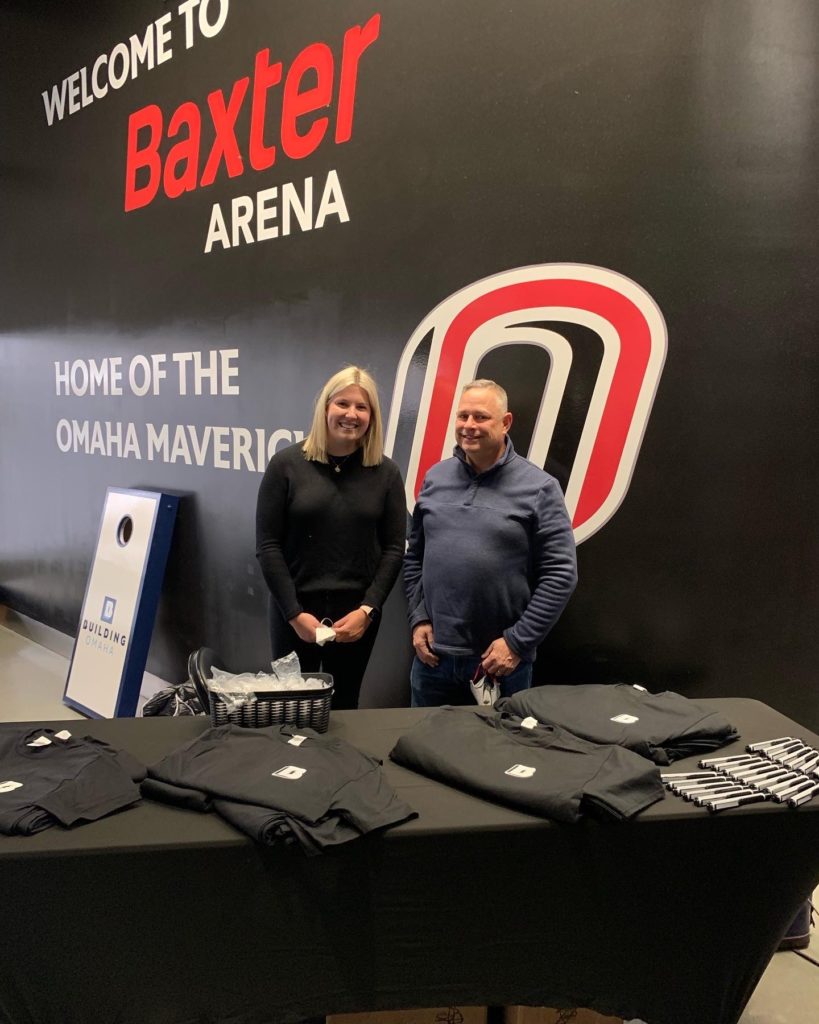 Mike and Maddie at UNO Hockey Game Booth